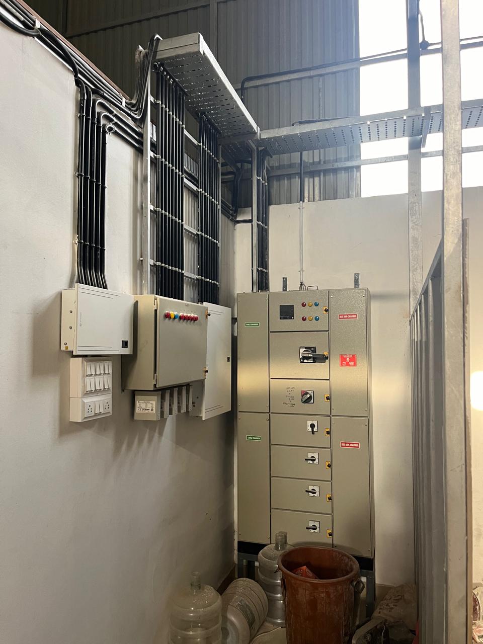 Industrial wiring and panel installation inside a factory
